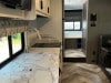 Kitchen of 32′ Forest River Sunseeker 3010 Class C in Northwood, NH